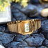 Casio VINTAGE digital watch with bracelet fully extended, gold-tone links visible