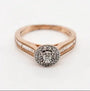 9ct rose gold diamond halo engagement ring with channel-set shoulders and milgrain detailing
