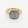 9ct yellow gold cushion cut diamond cluster engagement ring with double halo and pavé set shoulders on white background