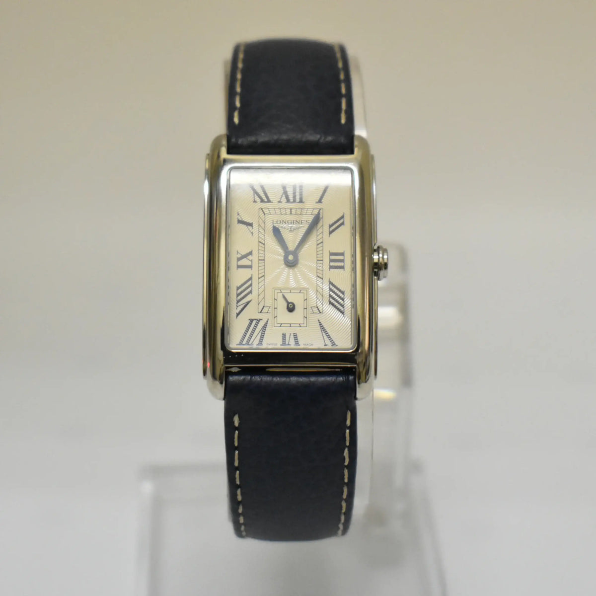 Pre-owned Longines DolceVita L5.512.4.71.7 rectangular stainless steel ladies watch with silver guilloche dial, Roman numerals, small seconds, and blue crocodile leather strap