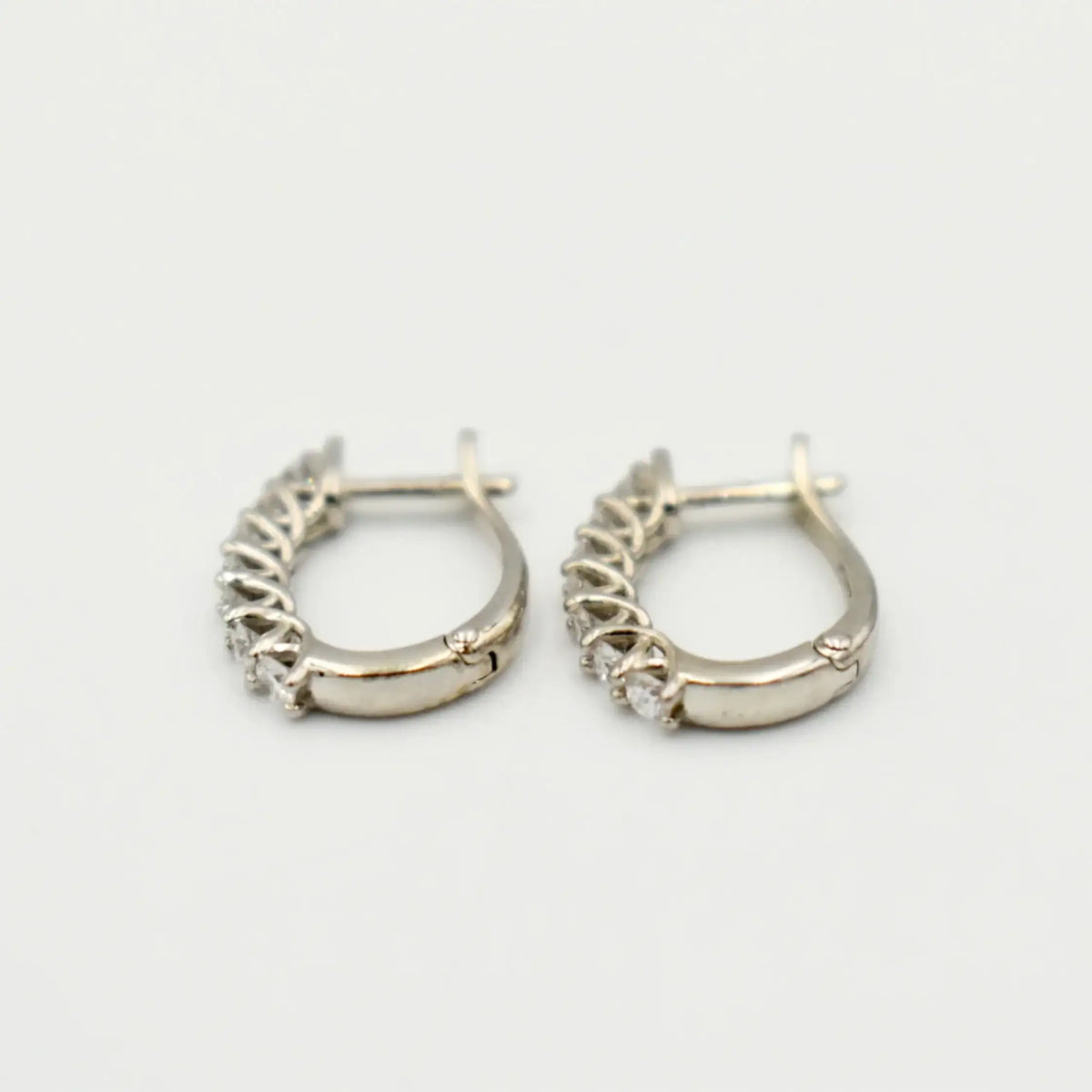 9ct white gold hoop earrings set with 0.371ct lab grown diamonds in pavé setting, displayed on neutral background