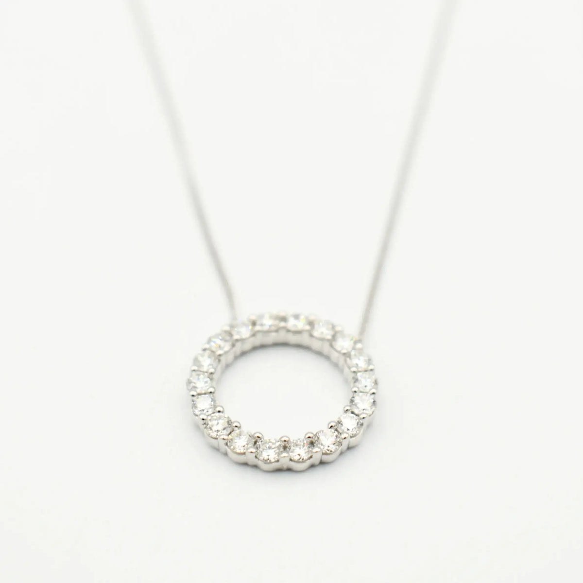 9ct white gold circle necklace with 0.49ct lab grown diamonds claw set in open circle pendant