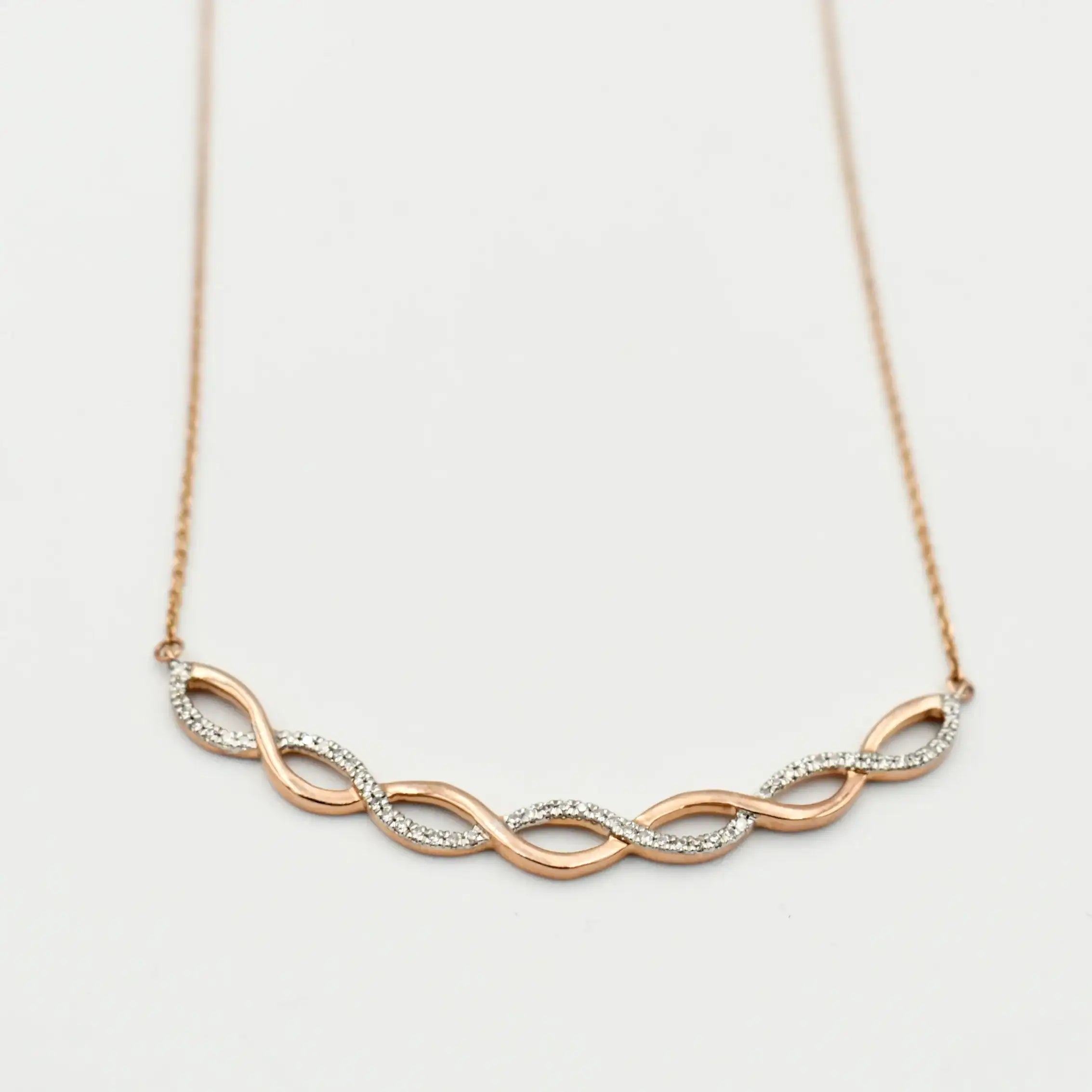 9ct rose gold diamond infinity necklace with 0.15ct pavé diamonds on delicate chain