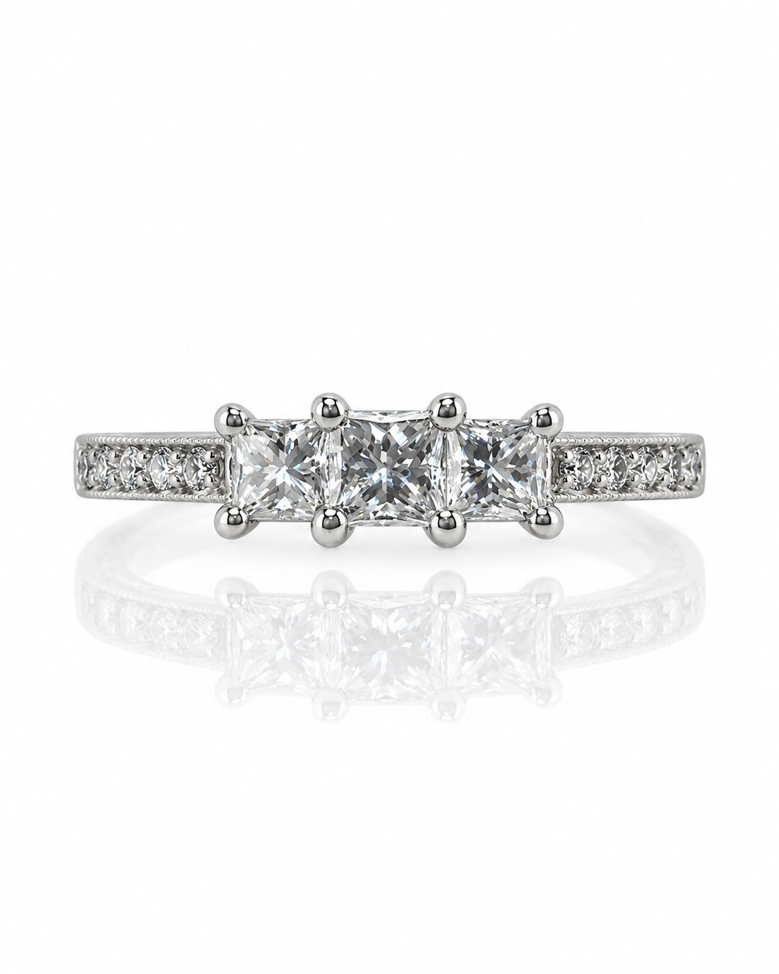 9ct white gold trilogy engagement ring with three princess-cut diamonds and pavé shoulders