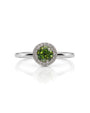 9ct white gold round peridot halo engagement ring with diamond surround and four-claw setting