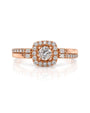 9ct rose gold cushion halo engagement ring with pavé shoulders and split shank
