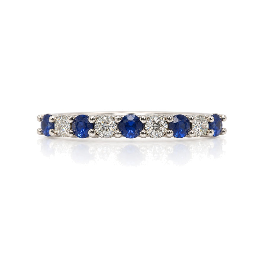9ct white gold half eternity band with alternating round blue sapphires and diamonds in claw setting