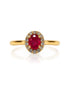 9ct yellow gold halo engagement ring with 0.47ct oval ruby and diamond halo
