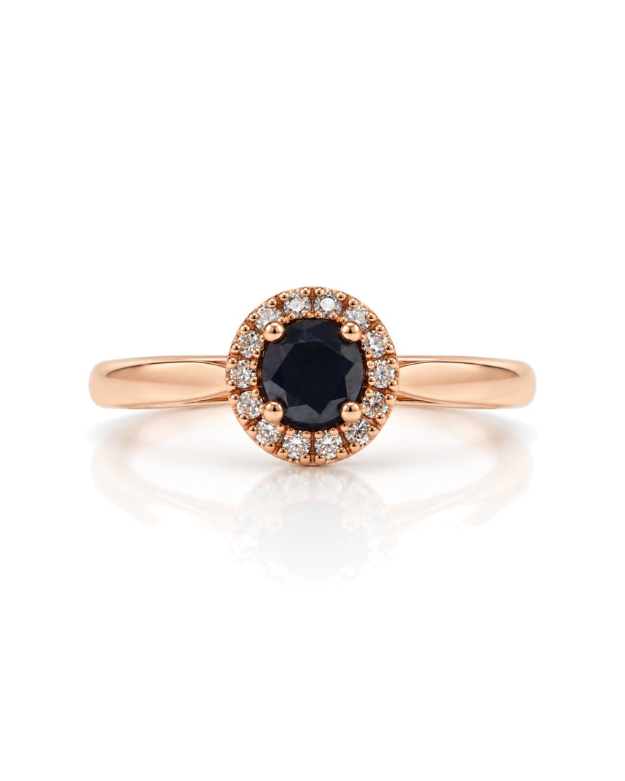 9ct rose gold halo engagement ring with round centre diamond and pavé-set diamond halo