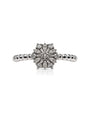9ct white gold diamond cluster dress ring with snowflake motif and beaded shank