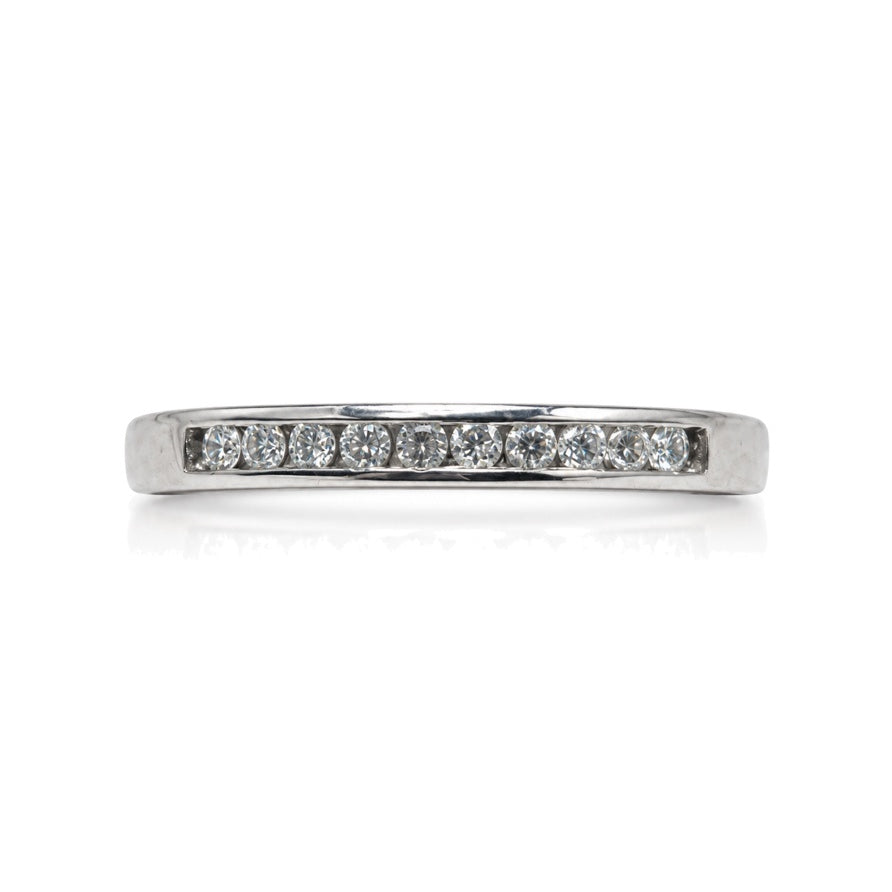 9ct white gold wedding band with channel-set round diamonds and polished court profile