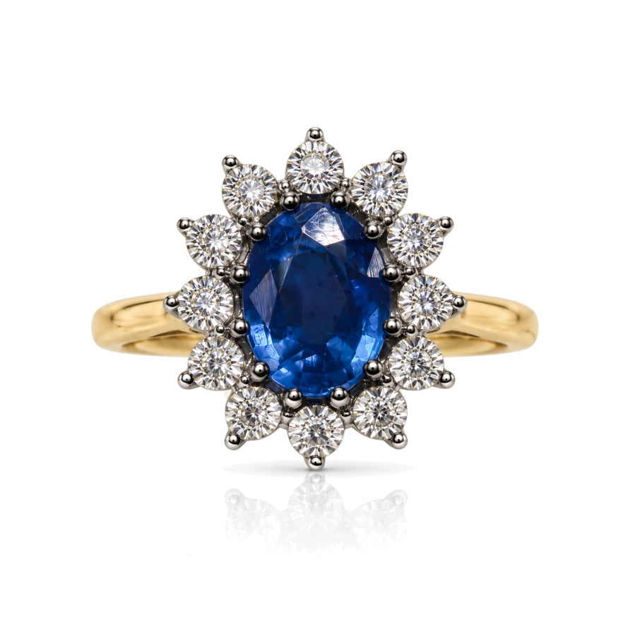 9ct yellow gold engagement ring with oval blue sapphire and diamond halo