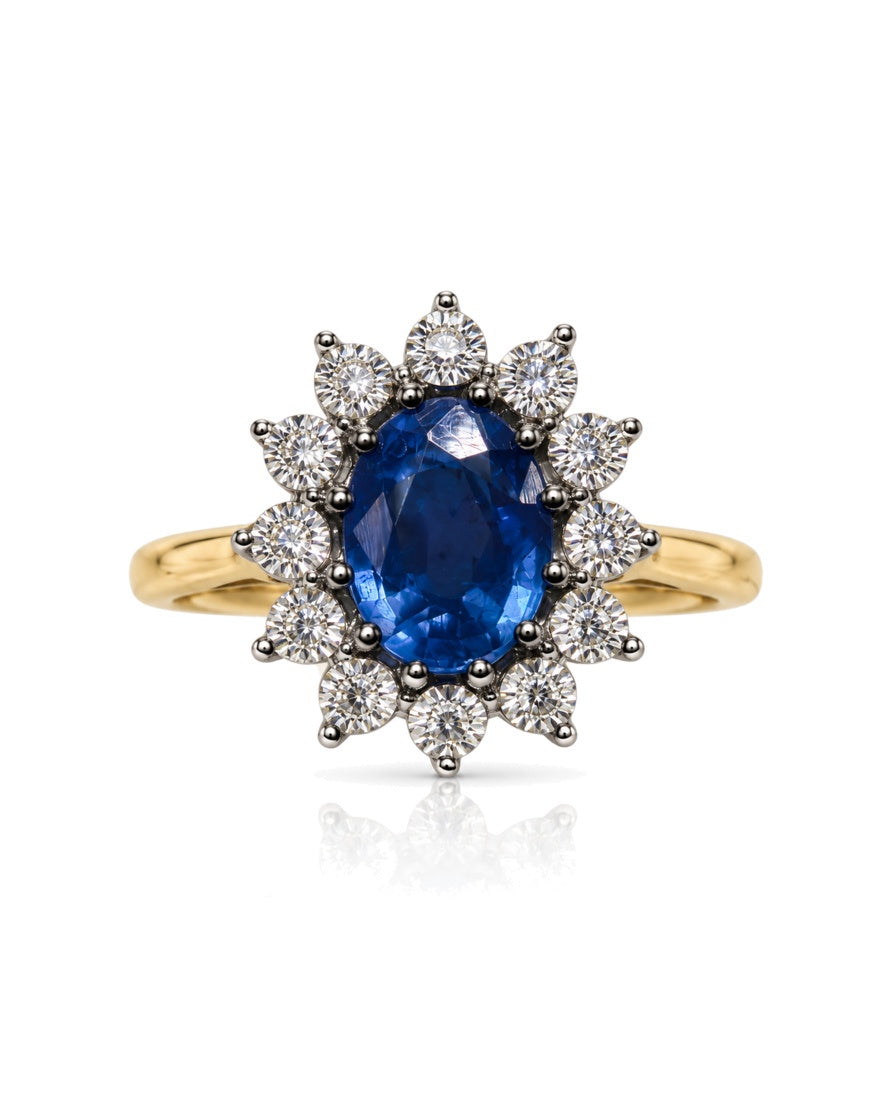9ct yellow gold engagement ring with oval blue sapphire and diamond halo