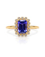 9ct yellow gold halo engagement ring with emerald cut tanzanite and pavé diamond halo
