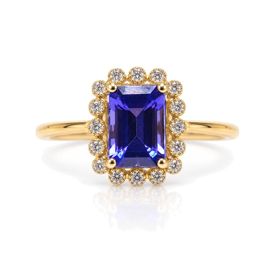 9ct yellow gold halo engagement ring with emerald cut tanzanite and pavé diamond halo