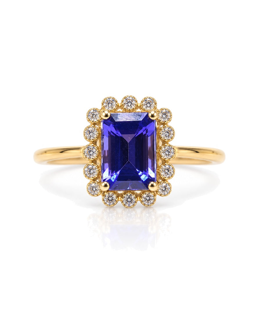 9ct yellow gold halo engagement ring with emerald cut tanzanite and pavé diamond halo