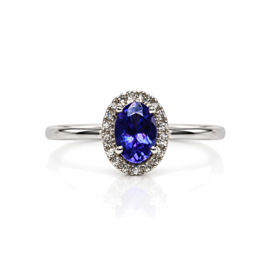 9ct white gold engagement ring with oval tanzanite centre stone and diamond halo