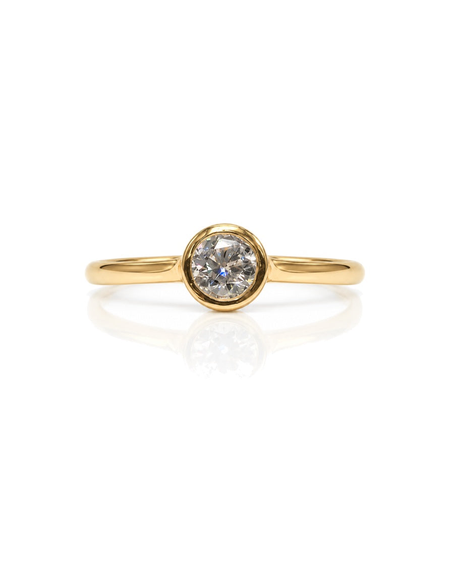 9ct yellow gold engagement ring with 0.25 carat round diamond in bezel setting