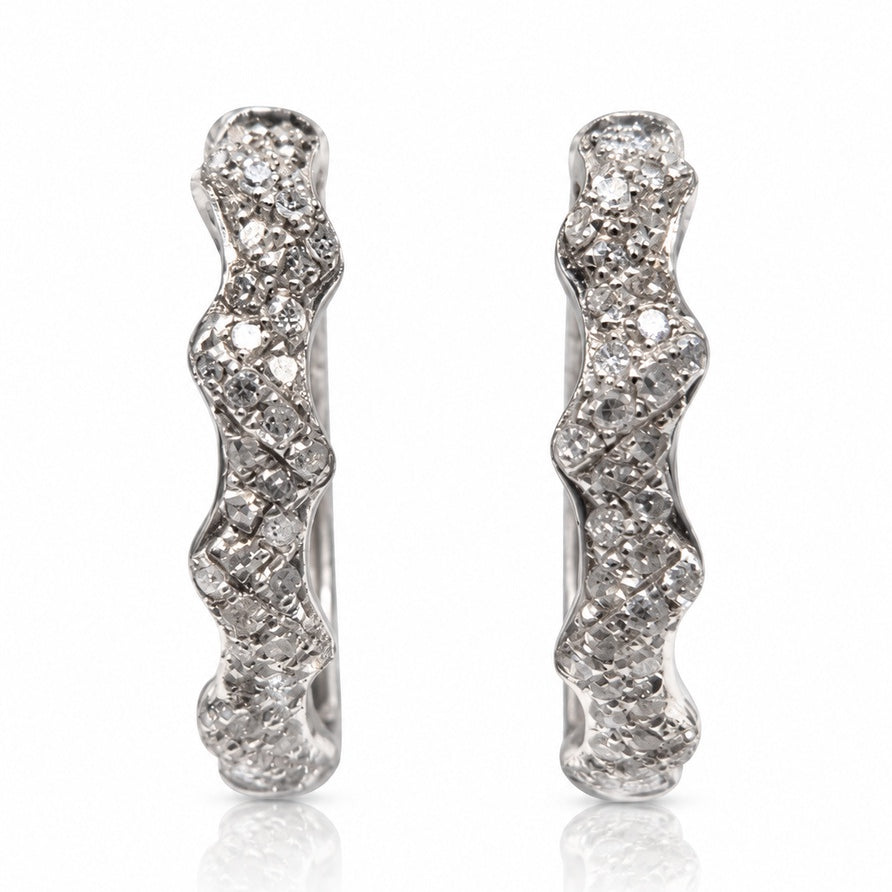 Polished 9ct White Gold huggie earrings with pavé-set diamonds and scalloped wave-edged outline