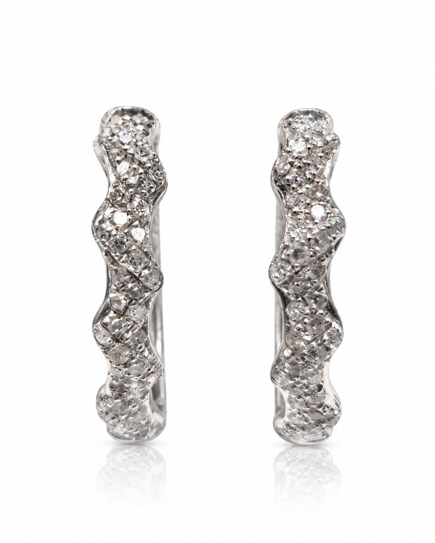 Polished 9ct White Gold huggie earrings with pavé-set diamonds and scalloped wave-edged outline