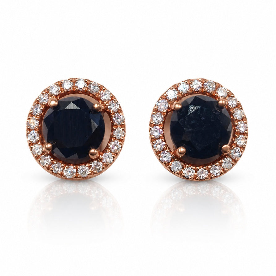 Pair of 9ct rose gold stud earrings with black diamond centres and white diamond halos