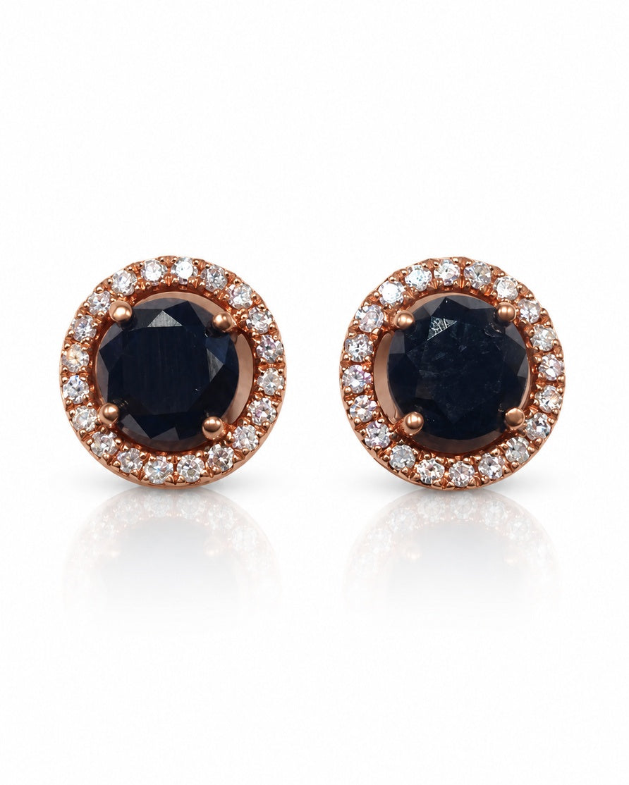 Pair of 9ct rose gold stud earrings with black diamond centres and white diamond halos