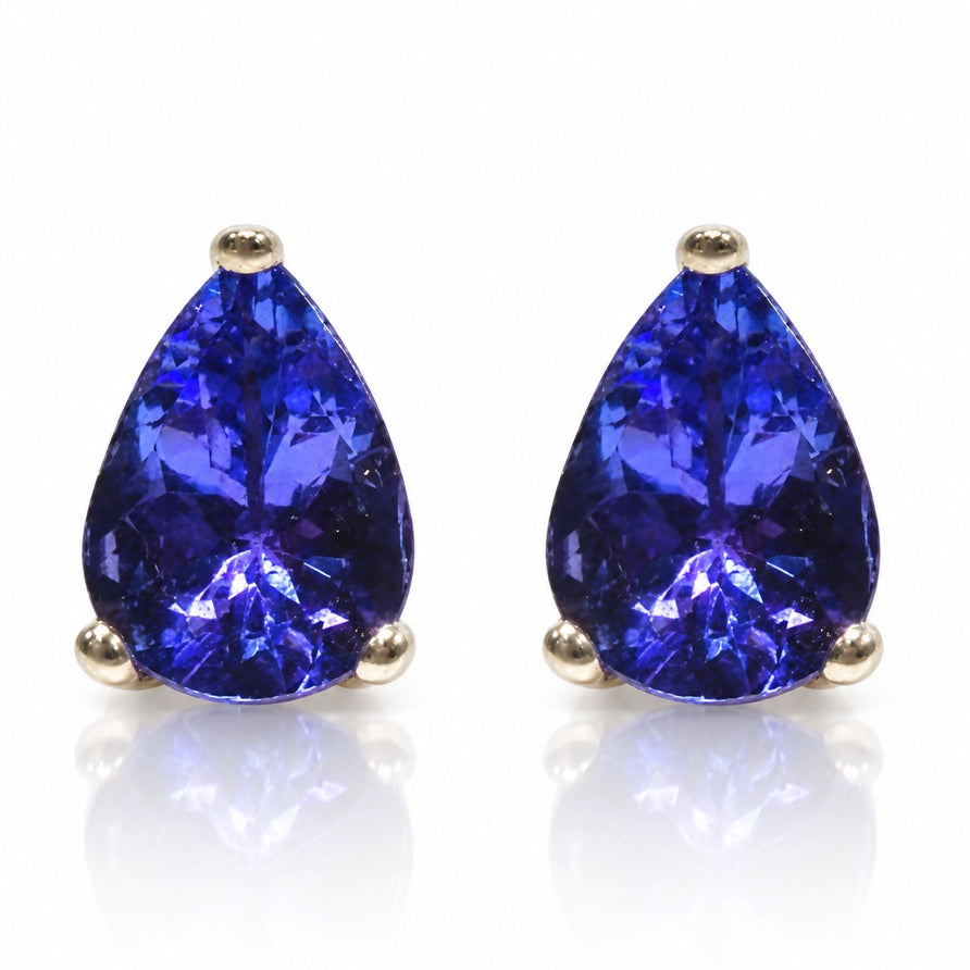 Pair of pear-cut blue tanzanite stud earrings in 9ct white gold three-claw settings