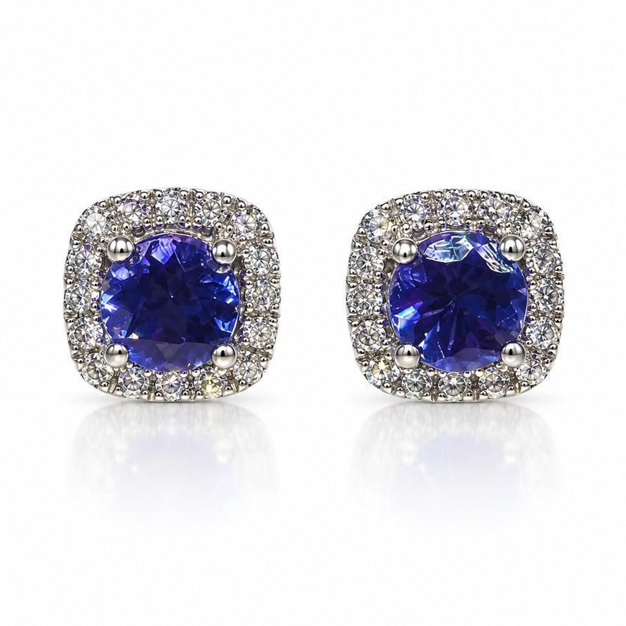 Pair of 14ct white gold halo stud earrings with round tanzanite centres and pavé diamonds