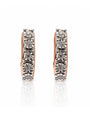 Rose gold huggie earring with five illusion-set round diamonds in a vertical row
