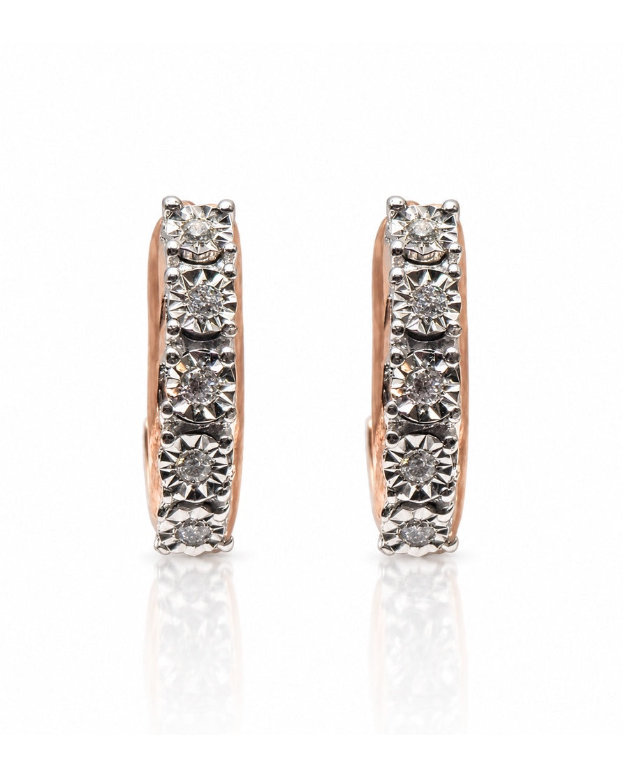 Rose gold huggie earring with five illusion-set round diamonds in a vertical row