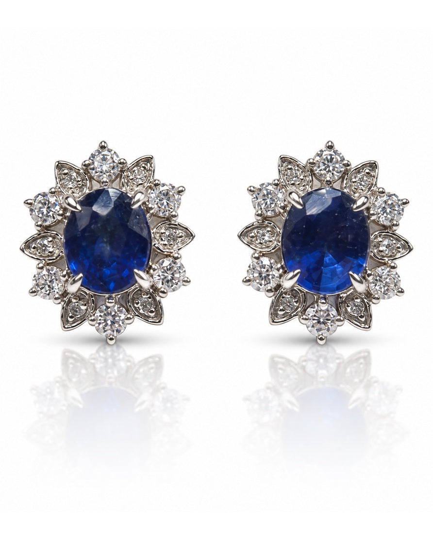 18ct white gold stud earring with oval blue sapphire and diamond floral halo