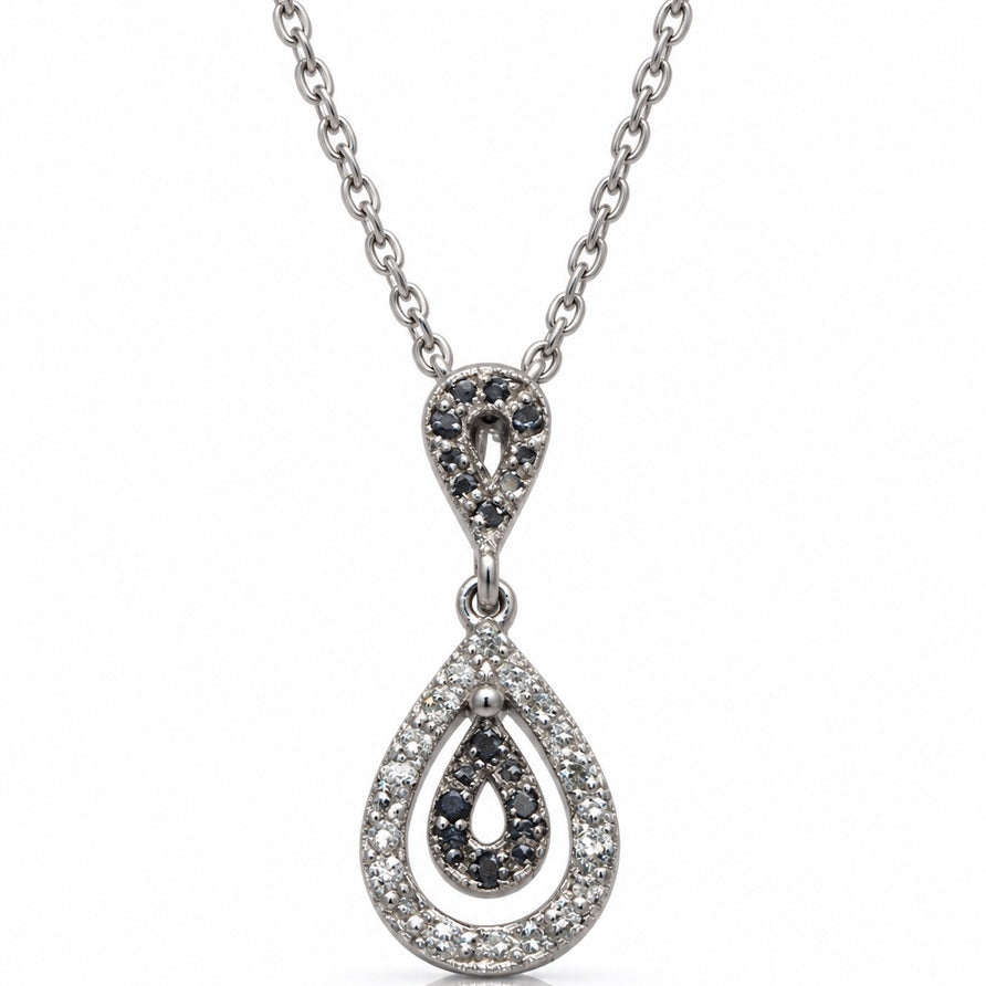 9ct white gold pear drop pendant with white and black pavé diamonds on trace chain
