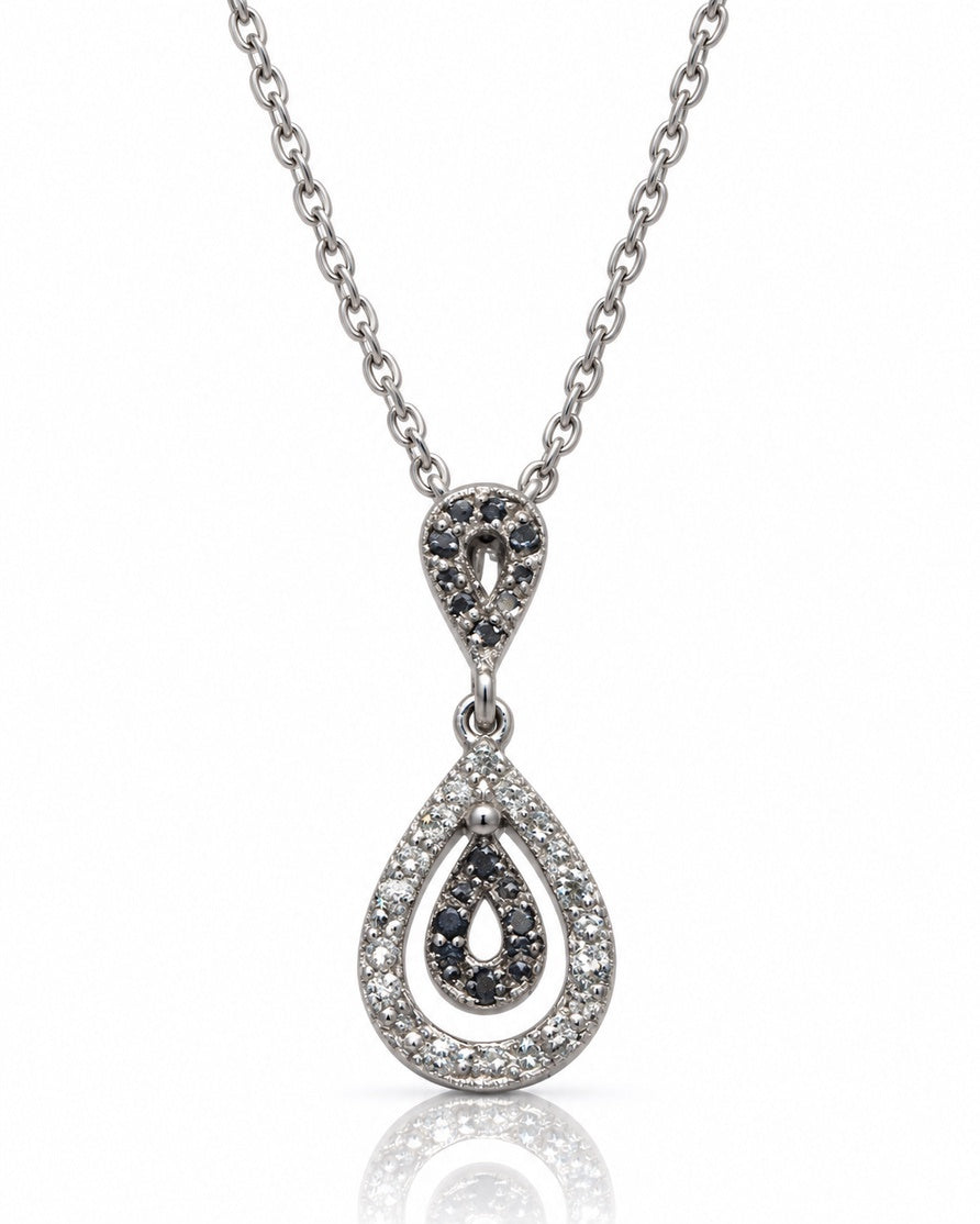 9ct white gold pear drop pendant with white and black pavé diamonds on trace chain