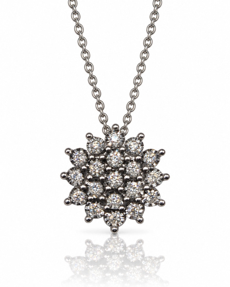 9ct White Gold diamond cluster pendant with starburst flower design on cable chain