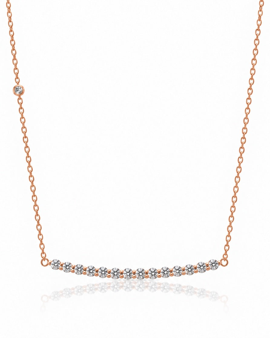 18ct rose gold journey pendant with curved bar of round diamonds on fine chain
