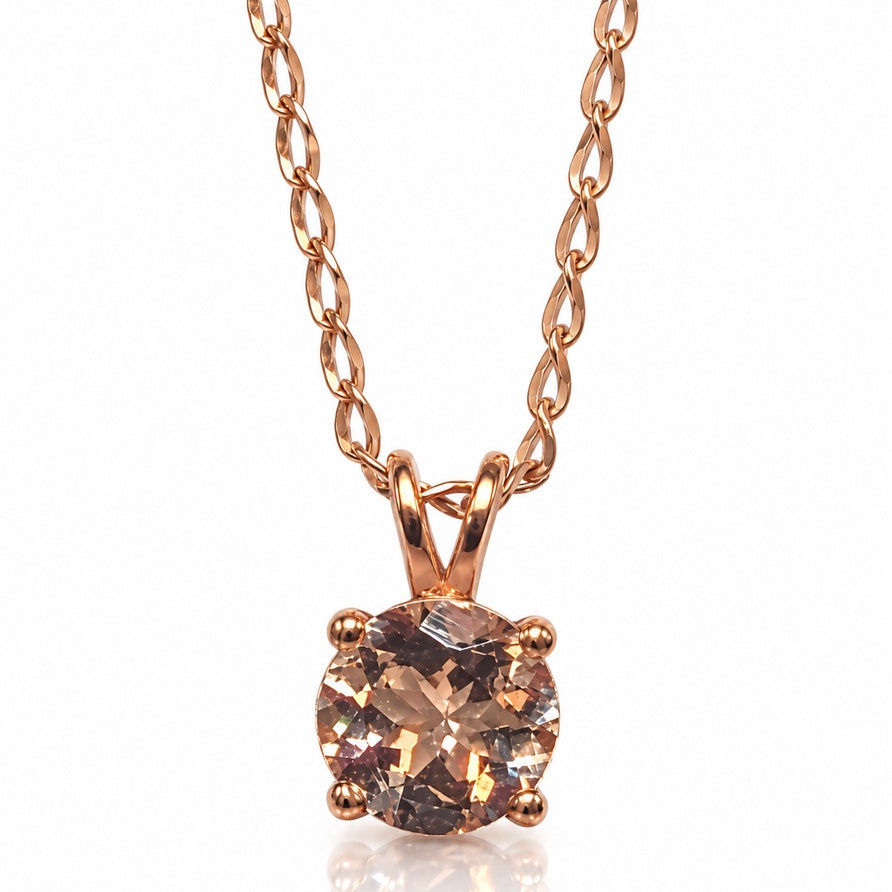 Round morganite solitaire pendant in 9ct rose gold with four ball-tipped claws on twisted curb chain
