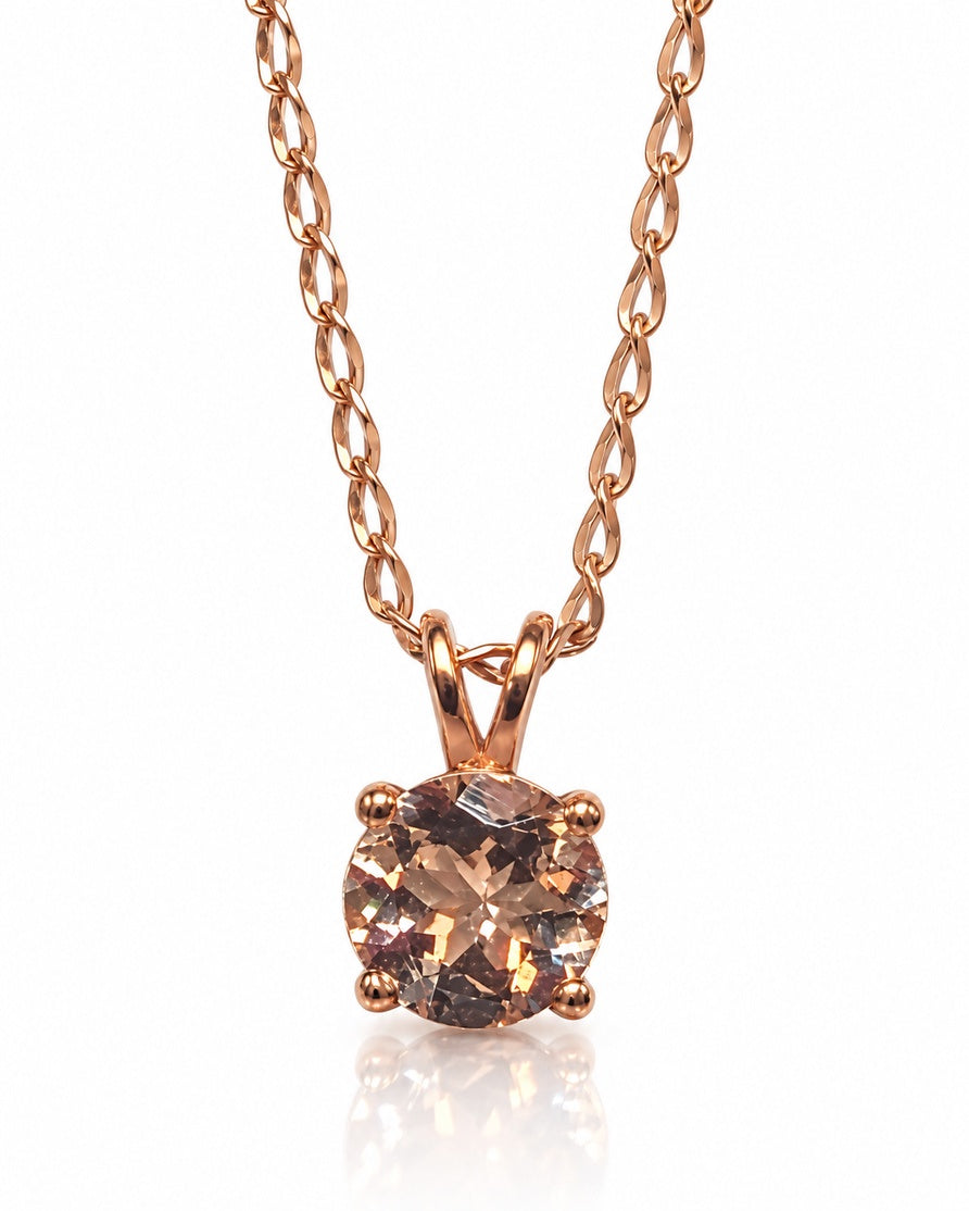 Round morganite solitaire pendant in 9ct rose gold with four ball-tipped claws on twisted curb chain