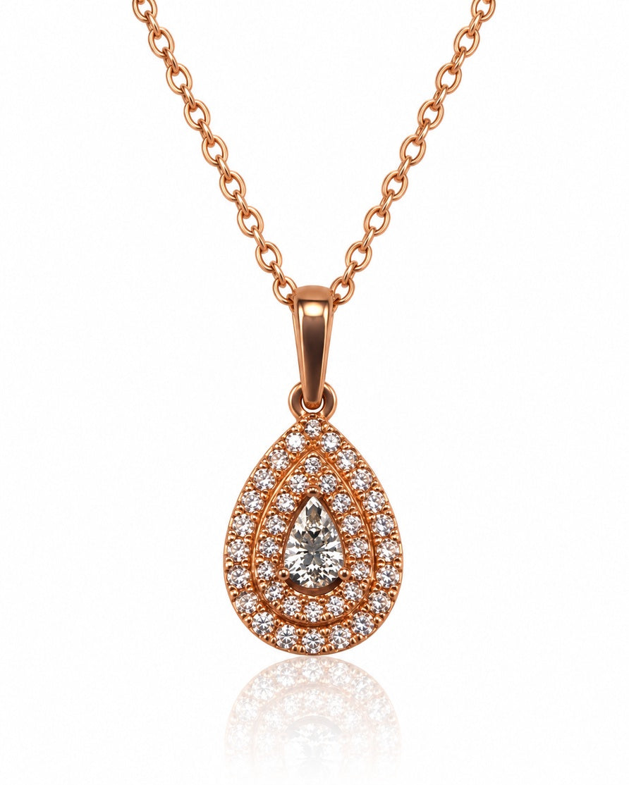 9ct rose gold pear-shaped diamond pendant with double pavé halo on fine cable chain