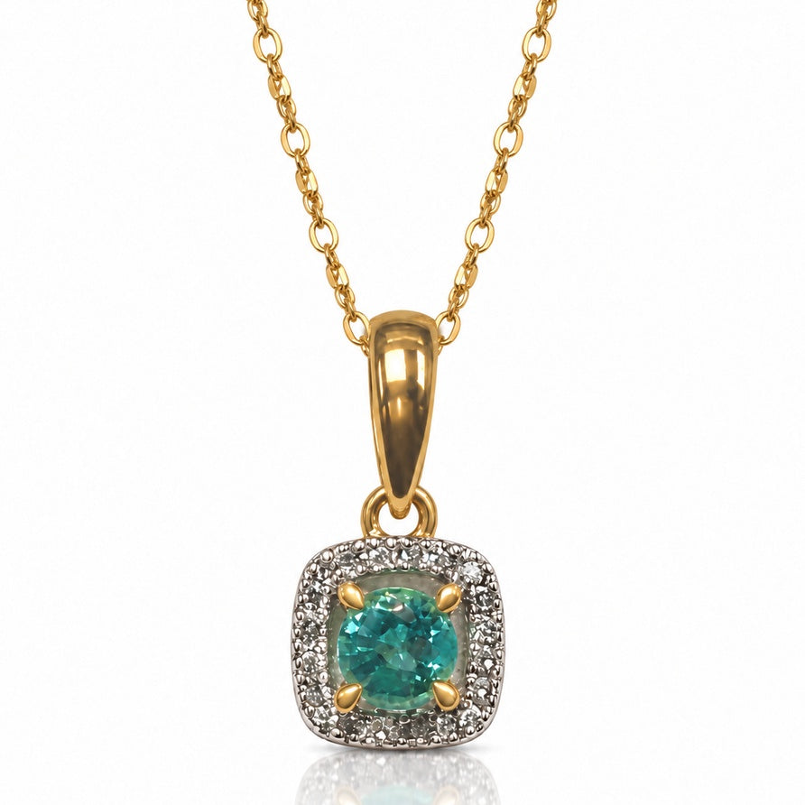 Round emerald in cushion-shaped diamond halo pendant on fine cable chain, 9ct yellow gold