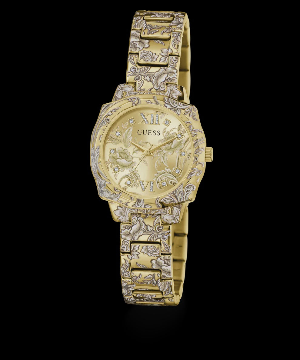 Guess GW1114L2 ladies quartz watch with cushion-shaped gold-tone case, floral embossed dial, Roman numeral crystal markers, and matching embossed stainless steel bracelet