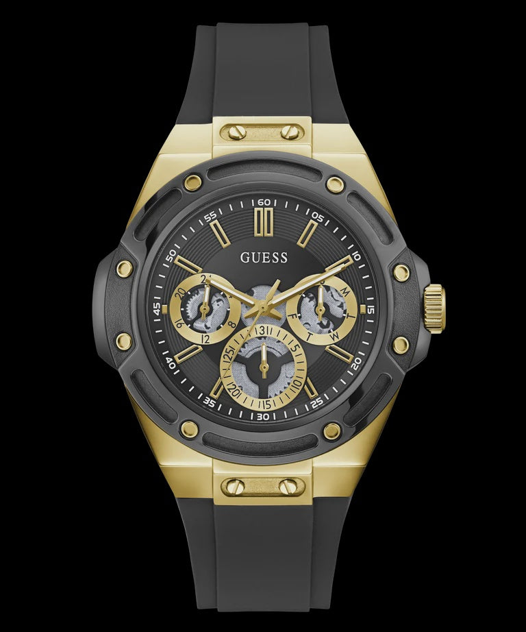 Guess Legacy GW1132G2 multifunction quartz watch with 44mm two-tone gold and gunmetal case, black textured dial with three sub-dials, luminous gold-tone hands and indices, and black silicone strap with buckle clasp