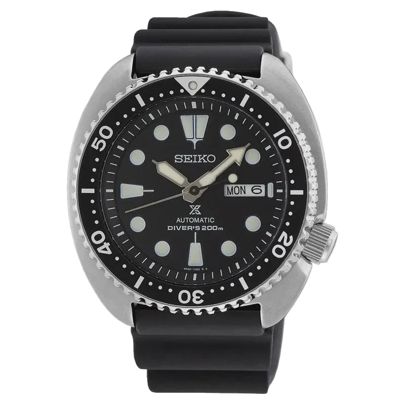 Seiko Prospex SRPE93K1 automatic diver's watch with black dial, cushion case, unidirectional bezel, and black silicone strap