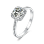 1ct round moissanite engagement ring with cushion halo and pavé band in sterling silver