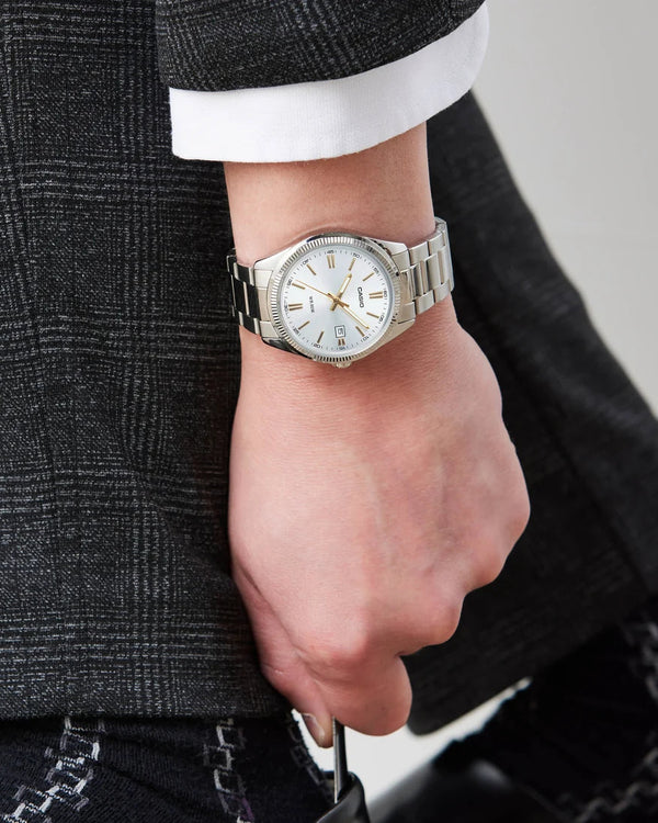 Casio MTP-1302D Quartz White Dial Stainless Steel Watch with Gold-Tone Accents (MTP-1302D-7A2VD)