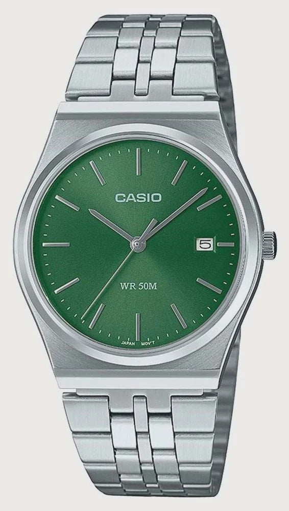 Casio MTP-B145D quartz watch with green sunburst dial and stainless steel bracelet on grey background