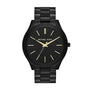 Michael Kors Slim Runway MK3221 black ion-plated stainless steel quartz watch with black dial and gold-tone markers on three-link bracelet