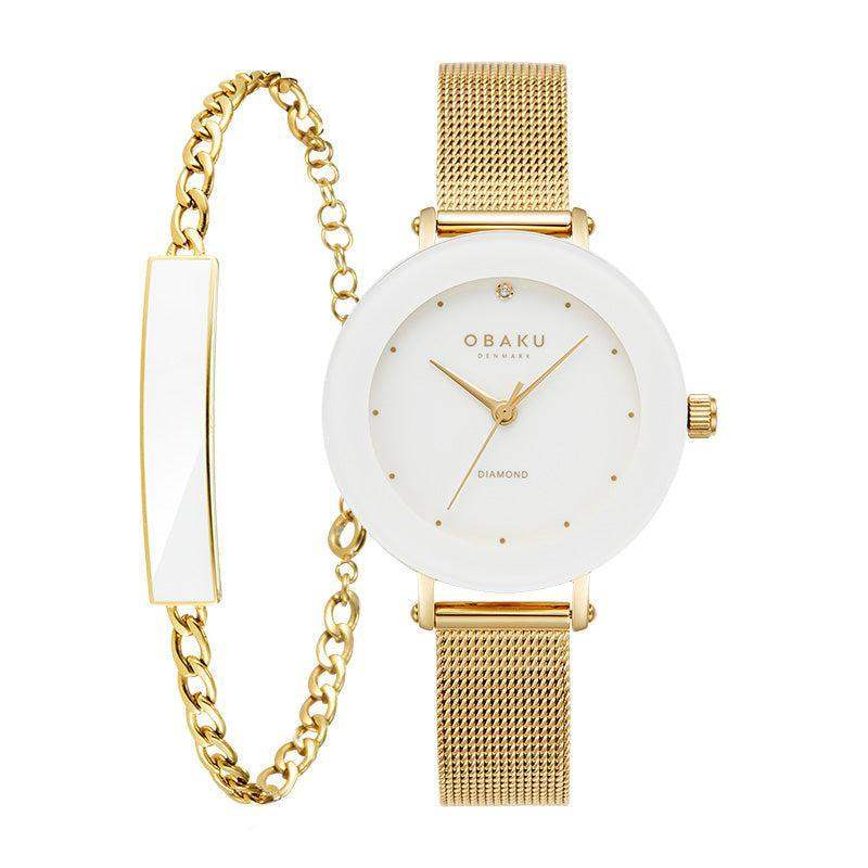 Obaku Lilje V299LXGWMG-EJBG ladies quartz watch with white dial, gold mesh bracelet, diamond marker at 12 o'clock, and matching gold chain bracelet gift set