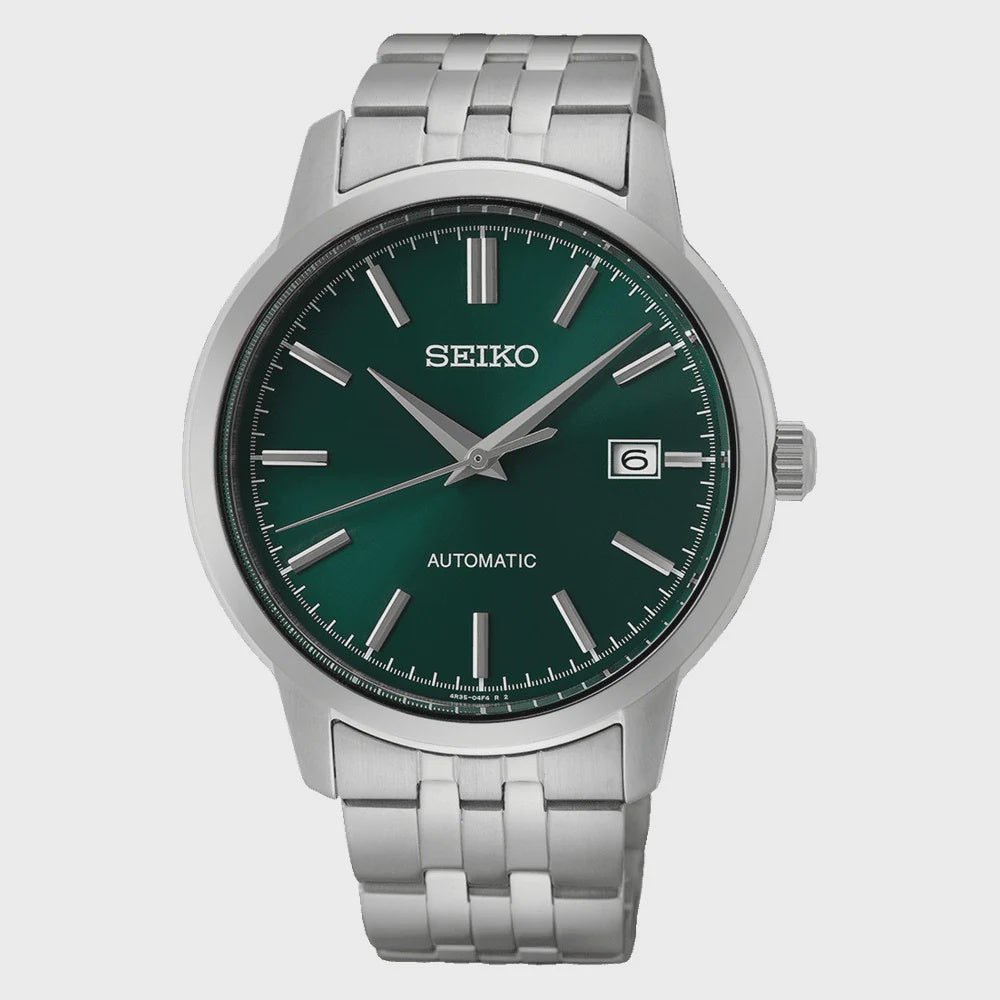Seiko SRPH89K1 automatic watch with green dial and stainless steel bracelet on grey background