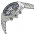 Three-fold clasp with push-button release on stainless steel bracelet