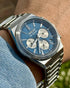Close view of silver sub-dials and applied indices on blue dial